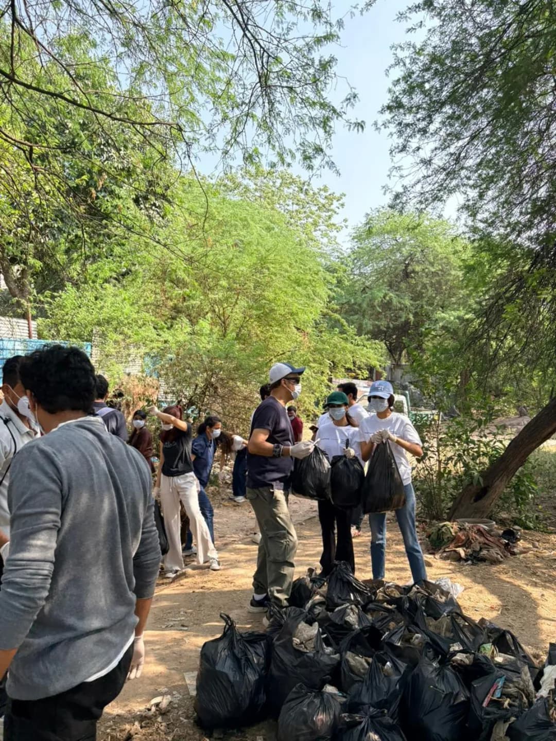 Volunteers at a Heritage Cleanliness Project drive in Delhi — panel 2, photograph 2